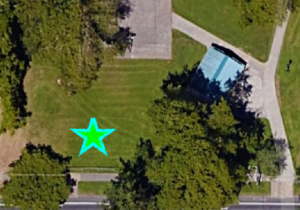 overhead map view with a star marking the location of the memorial tree